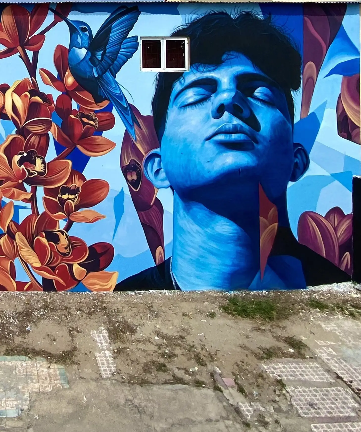 Lo de Aquí mural by Fio Silva & Sake Ink in San Nicolas