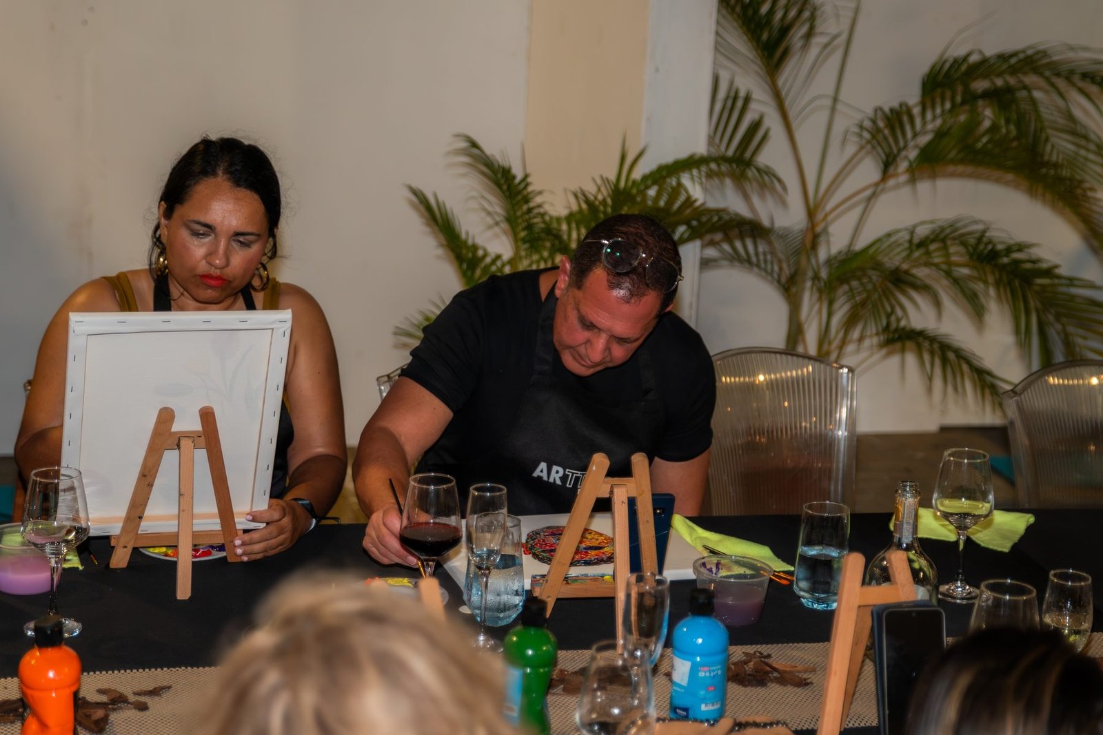 Guests painting at ArtTable 2026
